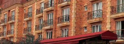Hotel Windsor House Inn By Geh Suites