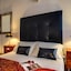 Tolentino Suites