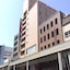 Hotel Tau